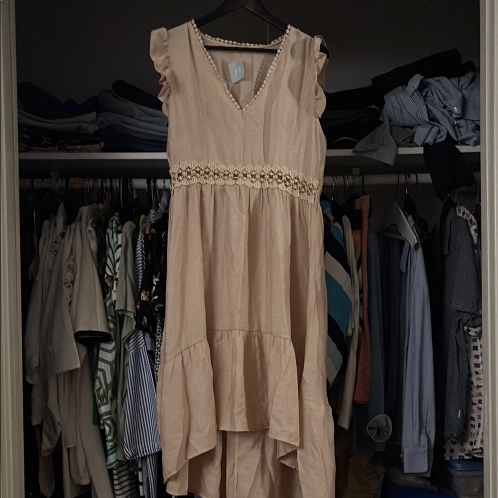 Elegant Beige Sleeveless Dress with lace cutout waistband